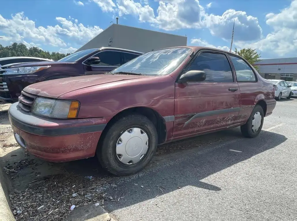 Used red Toyota car at McLarty Daniel Chrysler Dodge Jeep Ram Fiat
